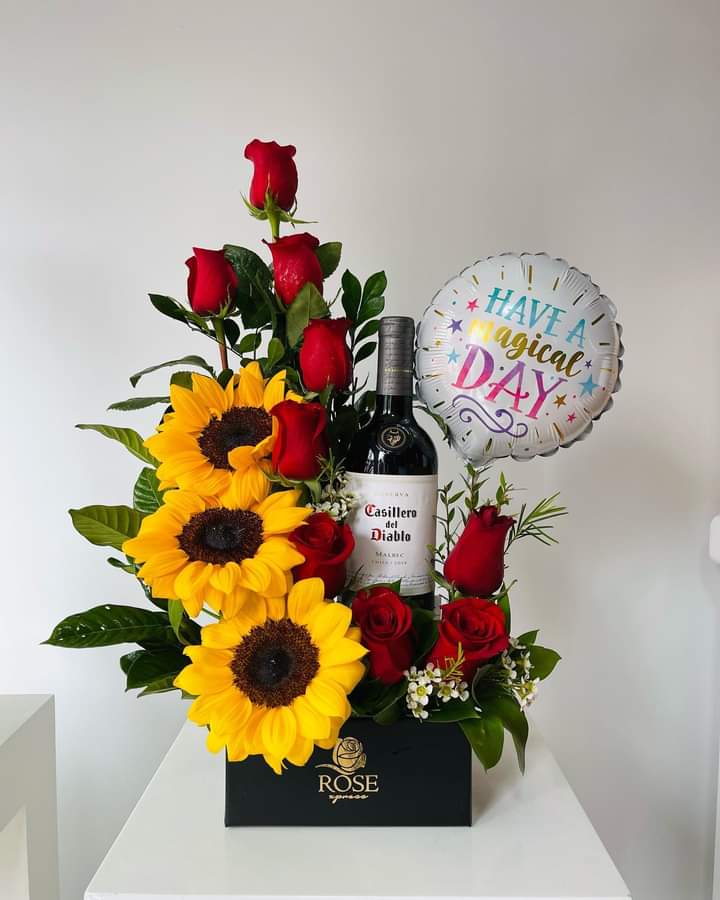 Box de flores con vino